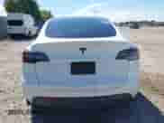 2023 Tesla Model Y Long Range with VIN 7SAYGDEE9PA033911, listed as a IAAI auction lot 43202182 with 35,938 mi miles and . Bid and sale history available at DreamBid. Image 16.