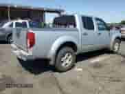 2006 Nissan Frontier SE z VIN 1N6AD07W96C449524, wystawiony jako Copart lot #70152475 z przebiegiem 206 553 mil mil oraz Szkoda całkowita • Salvage title. Historia ofert i sprzedaży dostępna na DreamBid. Obrazek 3.