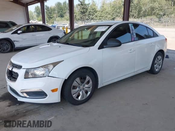 2016 Chevrolet Cruze LS z VIN 1G1PC5SH1G7221655, wystawiony jako IAAI lot #43140380 z przebiegiem 129 315 mil mil oraz . Historia ofert i sprzedaży dostępna na DreamBid. Obrazek 2.