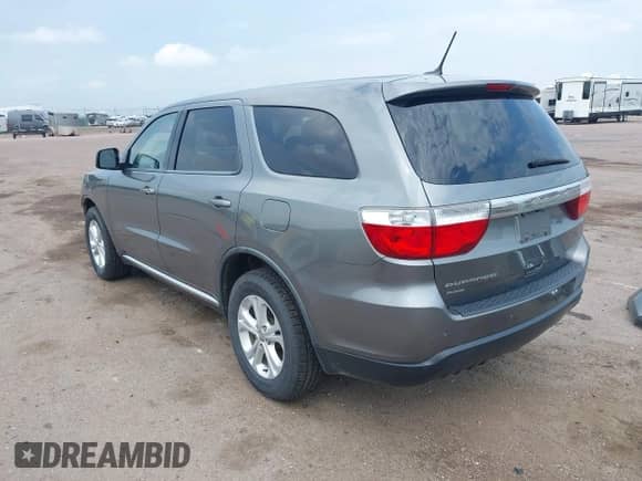 2012 Dodge Durango SXT with VIN 1C4RDJAG9CC181275, listed as a IAAI auction lot 42760696 with 211,805 mi miles and . Bid and sale history available at DreamBid. Image 3.
