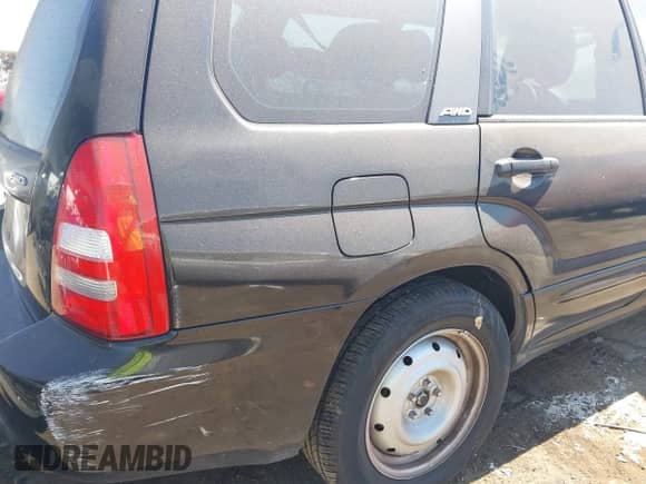 2004 Subaru Forester XT with VIN JF1SG69674H745243, listed as a IAAI auction lot 43200130 with 195,260 mi miles and . Bid and sale history available at DreamBid. Image 6.