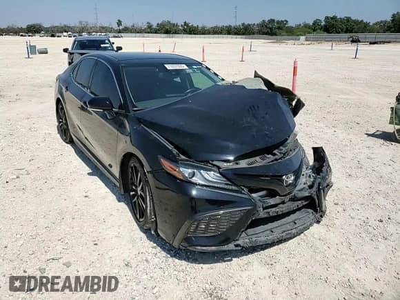 2021 Toyota Camry XSE with VIN 4T1K61AK9MU402834, listed as a Copart auction lot 71657335 with 77,028 mi miles and Salvage title. Bid and sale history available at DreamBid. Image 13.