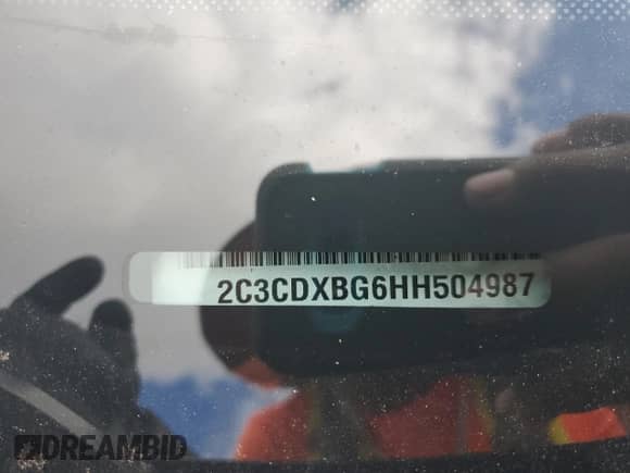 2017 Dodge Charger SE z VIN 2C3CDXBG6HH504987, wystawiony jako Copart lot #83934415 z przebiegiem Nie podano mil oraz Szkoda całkowita • Salvage title. Historia ofert i sprzedaży dostępna na DreamBid. Obrazek 13.