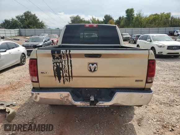 2011 Ram 1500 SLT с VIN 1D7RB1CP4BS577868, выставлен на аукционе Copart как лот 82217085 с пробегом 229 329 миль миль и Списание • Salvage title. История ставок и продаж доступна на DreamBid. Изображение 6.