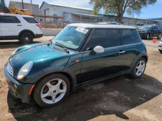 2006 MINI Hardtop with VIN WMWRC33516TJ75367, listed as a Copart auction lot 64686985 with 103,464 mi miles and Salvage title. Bid and sale history available at DreamBid. Image 1.