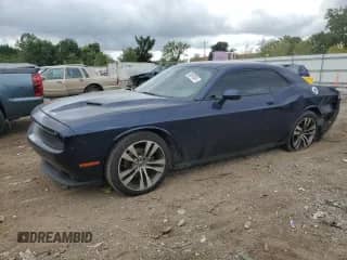 2015 Dodge Challenger SXT with VIN 2C3CDZAGXFH894616, listed as a Copart auction lot 82097045 with 140,952 mi miles and Salvage title. Bid and sale history available at DreamBid. Image 1.