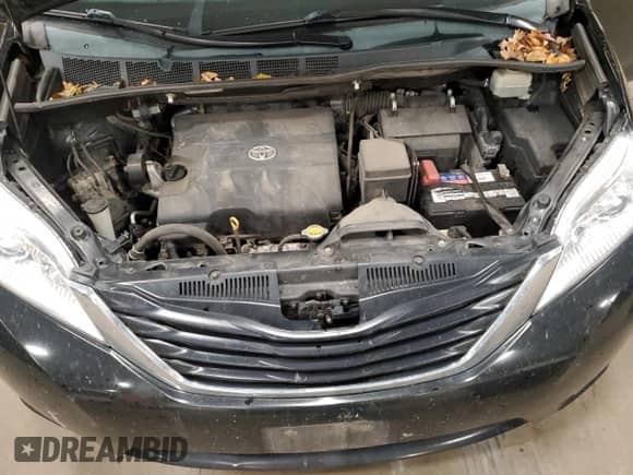 2013 Toyota Sienna LE AAS with VIN 5TDKK3DC9DS391564, listed as a Copart auction lot 82652825 with 194,558 mi miles and Salvage title. Bid and sale history available at DreamBid. Image 12.