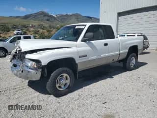 2000 Dodge 2500 with VIN 1B7KF2361YJ118129, listed as a Copart auction lot 55865215 with 146,220 mi miles and Salvage title. Bid and sale history available at DreamBid. Image 1.