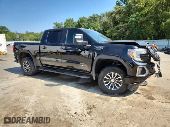 2019 GMC Sierra 1500 AT4 with VIN 1GTP9EEDXKZ219267, listed as a Copart auction lot 80254475 with 112,371 mi miles and Salvage title. Bid and sale history available at DreamBid. Image 4.