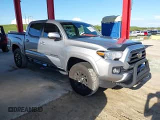 2020 Toyota Tacoma SR5 with VIN 3TMAZ5CN4LM128094, listed as a IAAI auction lot 42818941 with 67,866 mi miles and . Bid and sale history available at DreamBid. Image 1.