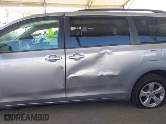 2013 Toyota Sienna LE AAS with VIN 5TDKK3DC2DS344974, listed as a IAAI auction lot 42560026 with 138,918 mi miles and . Bid and sale history available at DreamBid. Image 6.