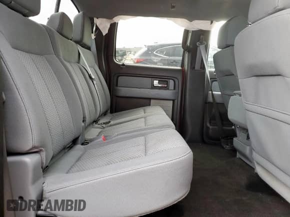 2014 Ford F-150 XL with VIN 1FTFW1CT7EFA11795, listed as a Copart auction lot 69200695 with 153,744 mi miles and Salvage title. Bid and sale history available at DreamBid. Image 10.