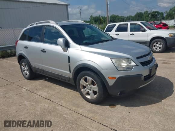 2013 Chevrolet Captiva Sport LS with VIN 3GNAL2EKXDS605487, listed as a IAAI auction lot 42639958 with 149,692 mi miles and . Bid and sale history available at DreamBid. Image 1.