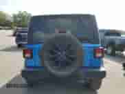 2023 Jeep Wrangler Sport S with VIN 1C4HJXDG7PW677814, listed as a Copart auction lot 67802085 with 28,546 mi miles and Salvage title. Bid and sale history available at DreamBid. Image 6.