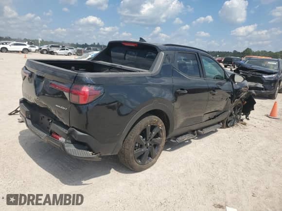 2024 Hyundai Santa Cruz Night Edition с VIN 5NTJCDDF7RH124723, выставлен на аукционе Copart как лот 71933884 с пробегом Не указан миль и Списание • Salvage title. История ставок и продаж доступна на DreamBid. Изображение 3.