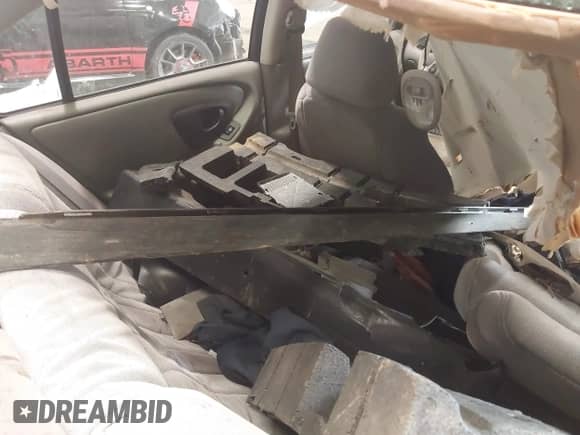 2004 Chevrolet Malibu Classic z VIN 1G1ND52F04M699548, wystawiony jako IAAI lot #41358609 z przebiegiem Nie podano mil oraz . Historia ofert i sprzedaży dostępna na DreamBid. Obrazek 8.