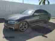 2020 BMW 5 Series M550i xDrive with VIN WBAJS7C06LCD34796, listed as a Copart auction lot 90484235 with 58,399 mi miles and Clean title. Bid and sale history available at DreamBid. Image 1.