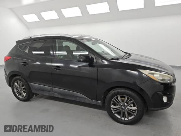 2015 Hyundai Tucson SE z VIN KM8JUCAG1FU038131, wystawiony jako Copart lot #84521605 z przebiegiem 147 573 mil mil oraz Czysty tytuł • Clean title. Historia ofert i sprzedaży dostępna na DreamBid. Obrazek 4.