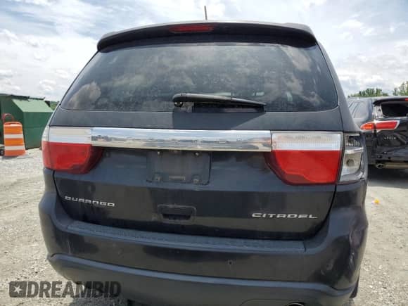 2013 Dodge Durango Citadel with VIN 1C4RDHEG8DC571935, listed as a Copart auction lot 60273705 with 169,219 mi miles and Salvage title. Bid and sale history available at DreamBid. Image 6.
