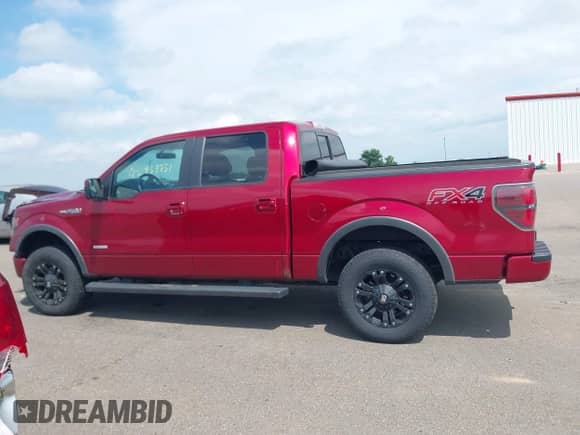 2013 Ford F-150 Lariat с VIN 1FTFW1ETXDKG30135, выставлен на аукционе IAAI как лот 42934751 с пробегом 216 435 миль миль и . История ставок и продаж доступна на DreamBid. Изображение 14.