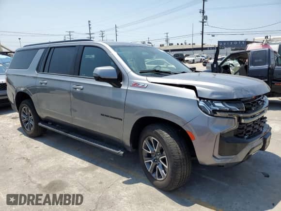 2022 Chevrolet Suburban Z71 с VIN 1GNSKDKDXNR331866, выставлен на аукционе Copart как лот 65722205 с пробегом 39 726 миль миль и Списание • Salvage title. История ставок и продаж доступна на DreamBid. Изображение 4.