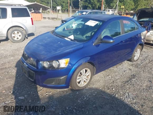 2012 Chevrolet Sonic LT with VIN 1G1JC5SB9C4207466, listed as a IAAI auction lot 43157488 with 98,200 mi miles and . Bid and sale history available at DreamBid. Image 2.