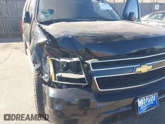 2013 Chevrolet Suburban LS with VIN 1GNSKHE76DR155667, listed as a IAAI auction lot 41053774 with 118,655 mi miles and . Bid and sale history available at DreamBid. Image 6.