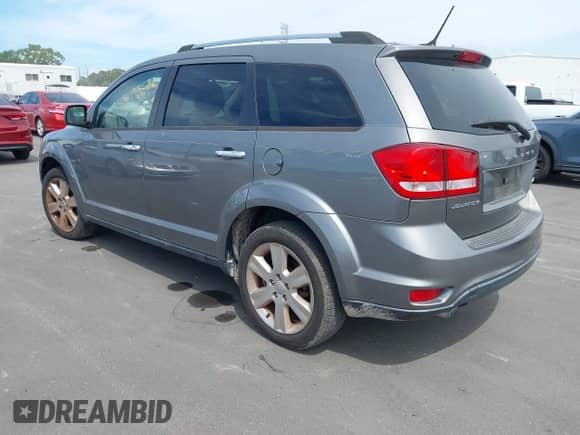 2012 Dodge Journey Crew with VIN 3C4PDCDG3CT207176, listed as a IAAI auction lot 43242158 with 173,632 mi miles and . Bid and sale history available at DreamBid. Image 3.