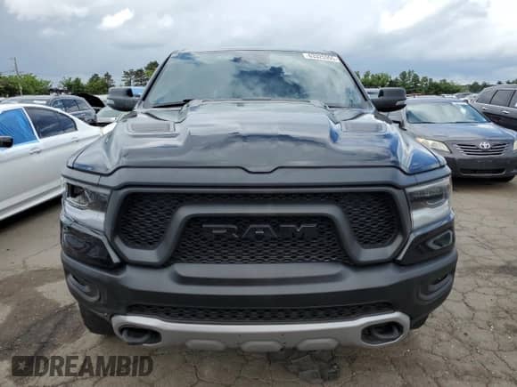 2023 Ram 1500 Rebel with VIN 1C6SRFLT9PN590999, listed as a Copart auction lot 63325355 with 82,896 mi miles and Salvage title. Bid and sale history available at DreamBid. Image 5.