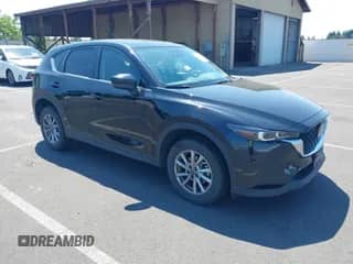 2023 Mazda CX-5 S Preferred z VIN JM3KFBCM1P0131456, wystawiony jako IAAI lot #42696205 z przebiegiem 65 060 mil mil oraz . Historia ofert i sprzedaży dostępna na DreamBid. Obrazek 1.