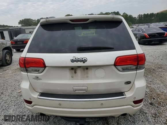 2017 Jeep Grand Cherokee Overland with VIN 1C4RJECG1HC773855, listed as a Copart auction lot 70180755 with 123,525 mi miles and Salvage title. Bid and sale history available at DreamBid. Image 6.