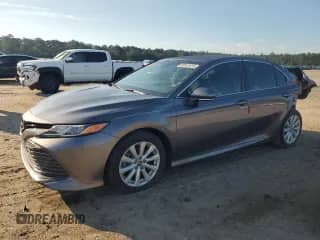 2019 Toyota Camry LE с VIN 4T1B11HK5KU794289, выставлен на аукционе Copart как лот 69141015 с пробегом 43 768 миль миль и Списание • Salvage title. История ставок и продаж доступна на DreamBid. Изображение 1.