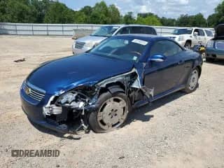 2003 Lexus SC 430 с VIN JTHFN48Y230048020, выставлен на аукционе Copart как лот 65790975 с пробегом 174 377 миль миль и Списание • Salvage title. История ставок и продаж доступна на DreamBid. Изображение 1.
