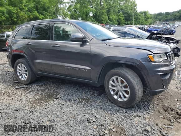 2021 Jeep Grand Cherokee Laredo E z VIN 1C4RJFAG1MC525298, wystawiony jako Copart lot #90879225 z przebiegiem 51 867 mil mil oraz Szkoda całkowita • Salvage title. Historia ofert i sprzedaży dostępna na DreamBid. Obrazek 4.