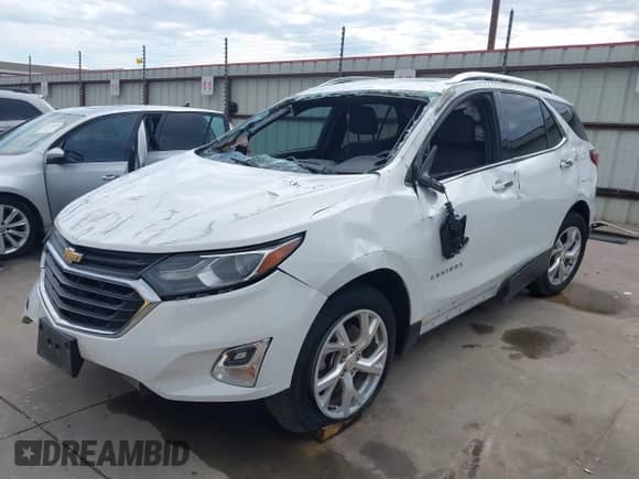 2018 Chevrolet Equinox LT with VIN 2GNAXKEX5J6158772, listed as a IAAI auction lot 43394872 with 102,480 mi miles and . Bid and sale history available at DreamBid. Image 6.