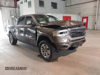 2020 Ram 1500 Longhorn with VIN 1C6SRFKT1LN275397, listed as a IAAI auction lot 42733634 with 101,019 mi miles and . Bid and sale history available at DreamBid. Image 1.