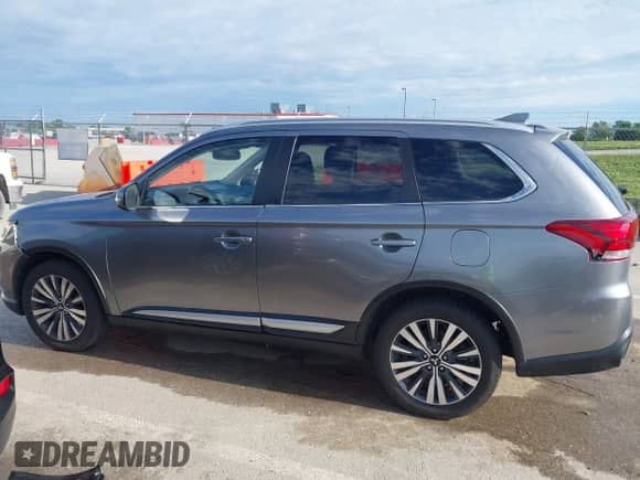 2020 Mitsubishi Outlander SE z VIN JA4AD3A33LJ001719, wystawiony jako IAAI lot #42270888 z przebiegiem 95 794 mil mil oraz . Historia ofert i sprzedaży dostępna na DreamBid. Obrazek 14.