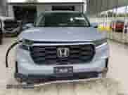 2023 Honda Pilot Elite with VIN 5FNYG1H85PB049348, listed as a Copart auction lot 82314915 with 26,002 mi miles and Salvage title. Bid and sale history available at DreamBid. Image 5.