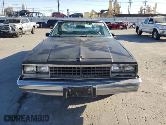 1984 Chevrolet El Camino с VIN 1GCCW80H6ER181690, выставлен на аукционе Copart как лот 84205954 с пробегом 75 912 миль миль и Списание • Salvage title. История ставок и продаж доступна на DreamBid. Изображение 5.