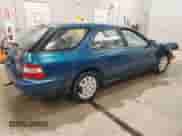 1994 Honda Accord LX с VIN 1HGCE1821RA004495, выставлен на аукционе Copart как лот 64223535 с пробегом Не указан миль и Чистый • Clean title. История ставок и продаж доступна на DreamBid. Изображение 3.