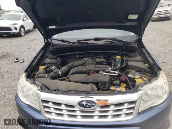 2012 Subaru Forester X Premium с VIN JF2SHBDC3CH447317, выставлен на аукционе Copart как лот 58572385 с пробегом 151 676 миль миль и Списание • Salvage title. История ставок и продаж доступна на DreamBid. Изображение 13.