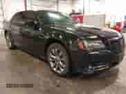 2014 Chrysler 300 S with VIN 2C3CCAGG3EH331532, listed as a IAAI auction lot 42560164 with 164,617 mi miles and . Bid and sale history available at DreamBid. Image 1.