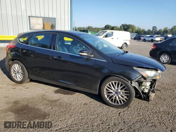 2014 Ford Focus Titanium with VIN 1FADP3N22EL161938, listed as a Copart auction lot 83815915 with 108,682 mi miles and Salvage title. Bid and sale history available at DreamBid. Image 4.