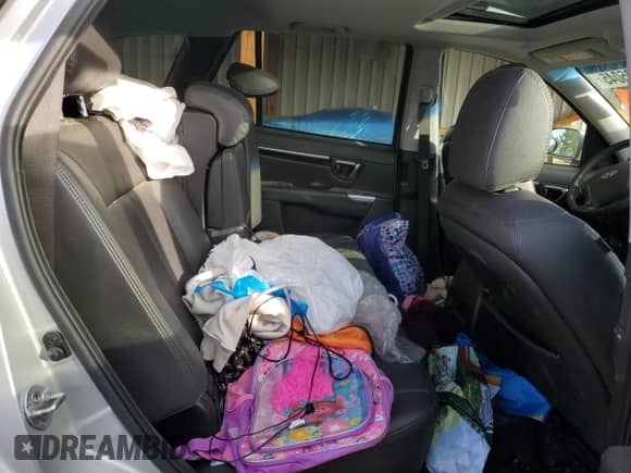 2012 Hyundai Santa Fe Limited с VIN 5XYZKDAG6CG120677, выставлен на аукционе Copart как лот 89695045 с пробегом Не указан миль и Списание • Salvage title. История ставок и продаж доступна на DreamBid. Изображение 10.