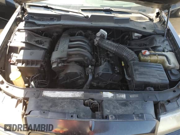 2007 Chrysler 300 with VIN 2C3KA43R27H626621, listed as a Copart auction lot 70741115 with 179,433 mi miles and Salvage title. Bid and sale history available at DreamBid. Image 11.