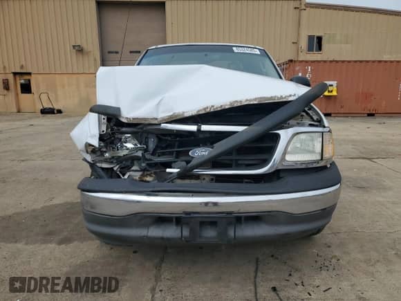 2003 Ford F-150 XL with VIN 1FTRX17213NB44096, listed as a Copart auction lot 85324585 with 247,714 mi miles and Salvage title. Bid and sale history available at DreamBid. Image 5.