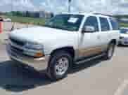2005 Chevrolet Tahoe LT z VIN 1GNEC13T65J229350, wystawiony jako IAAI lot #42532336 z przebiegiem 244 869 mil mil oraz . Historia ofert i sprzedaży dostępna na DreamBid. Obrazek 2.