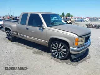 1994 GMC Sierra 1500 z VIN 2GTEC19K7R1555049, wystawiony jako IAAI lot #42316465 z przebiegiem 242 883 mil mil oraz . Historia ofert i sprzedaży dostępna na DreamBid. Obrazek 1.