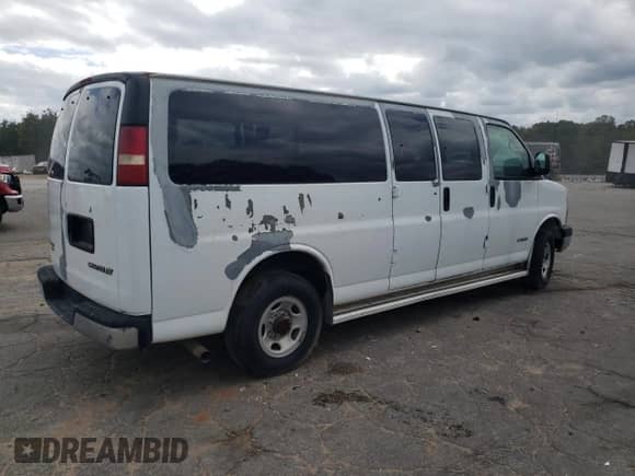 2004 Chevrolet Express Passenger z VIN 1GAHG39U641208561, wystawiony jako Copart lot #47579375 z przebiegiem Nie podano mil oraz Szkoda całkowita • Salvage title. Historia ofert i sprzedaży dostępna na DreamBid. Obrazek 3.