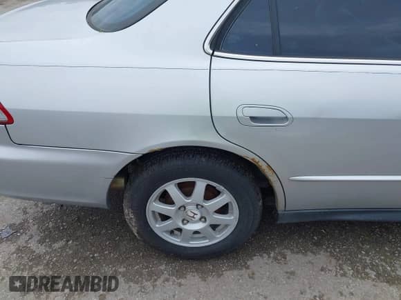 2002 Honda Accord SE with VIN 1HGCG56712A088663, listed as a IAAI auction lot 42520639 with 230,496 mi miles and . Bid and sale history available at DreamBid. Image 13.